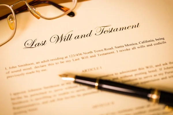 stock photo last will and testament with pen and glasses concept for legal d
